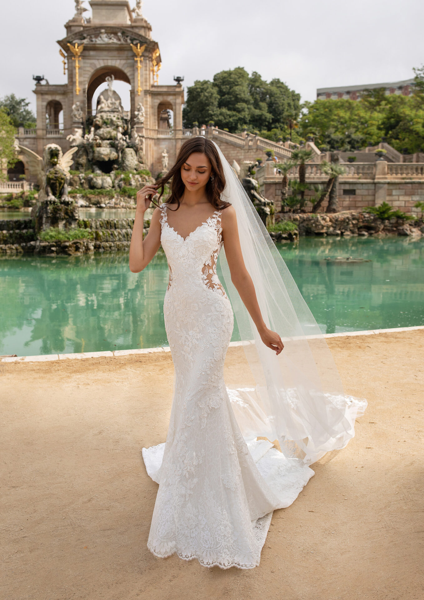 A woman in a white dress and veil